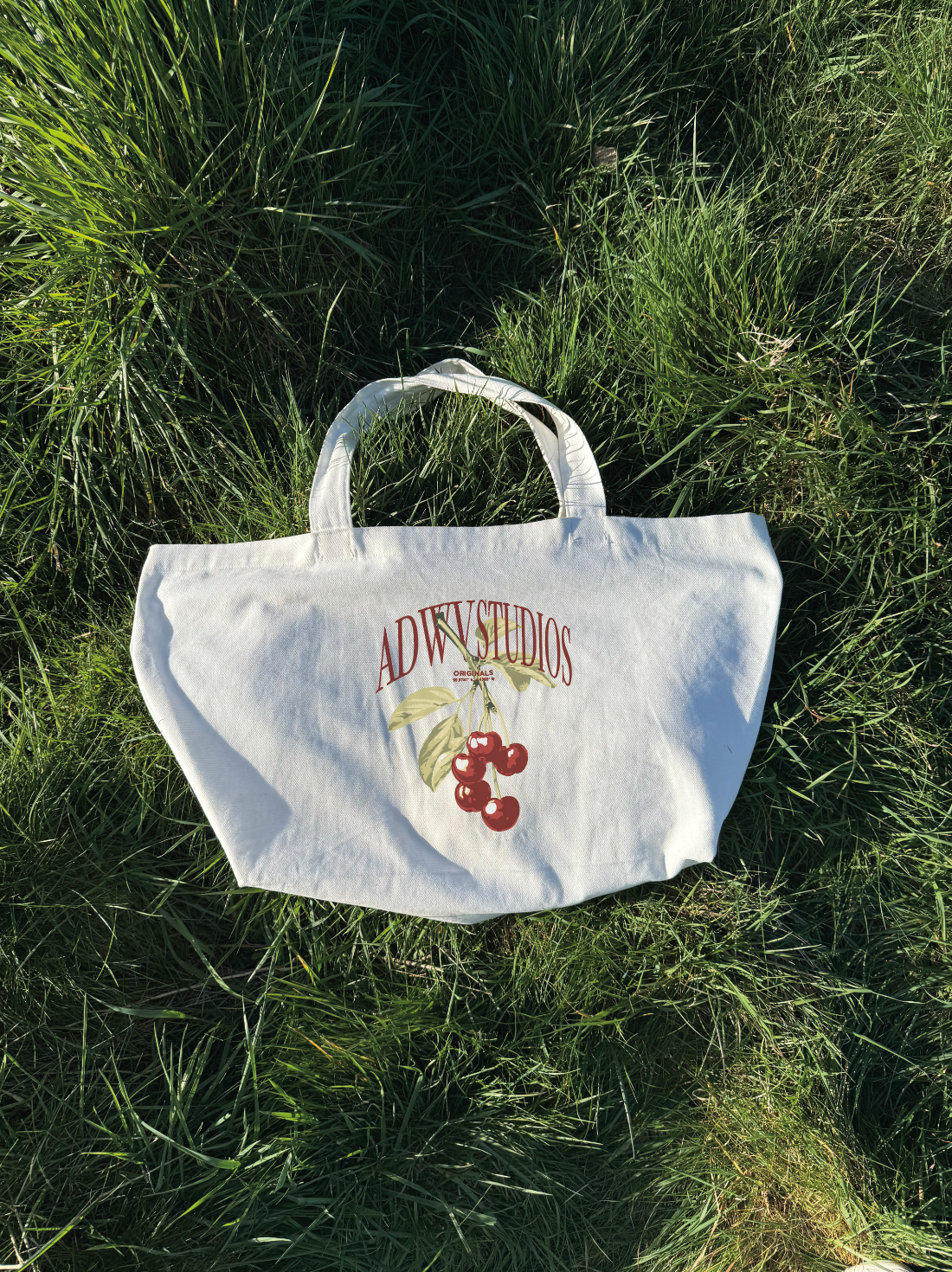 CHERRY STUDIOS TOTE BAG